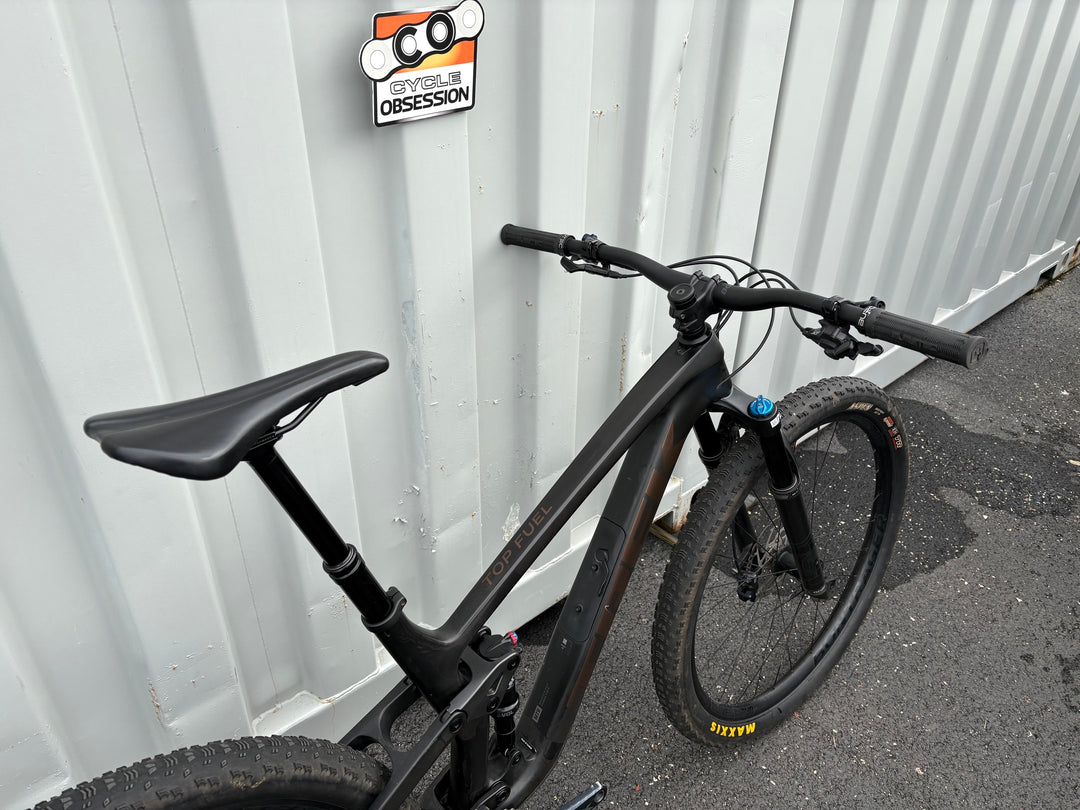 Trek Top Fuel 9.7 - Matte Raw Carbon  (Ex Staff Bike)